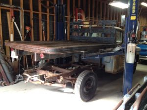 Flat bed lifted off of 1956 Chevrolet 3600 truck