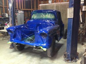 Truck cab exterior painted a brilliant shade of blue.