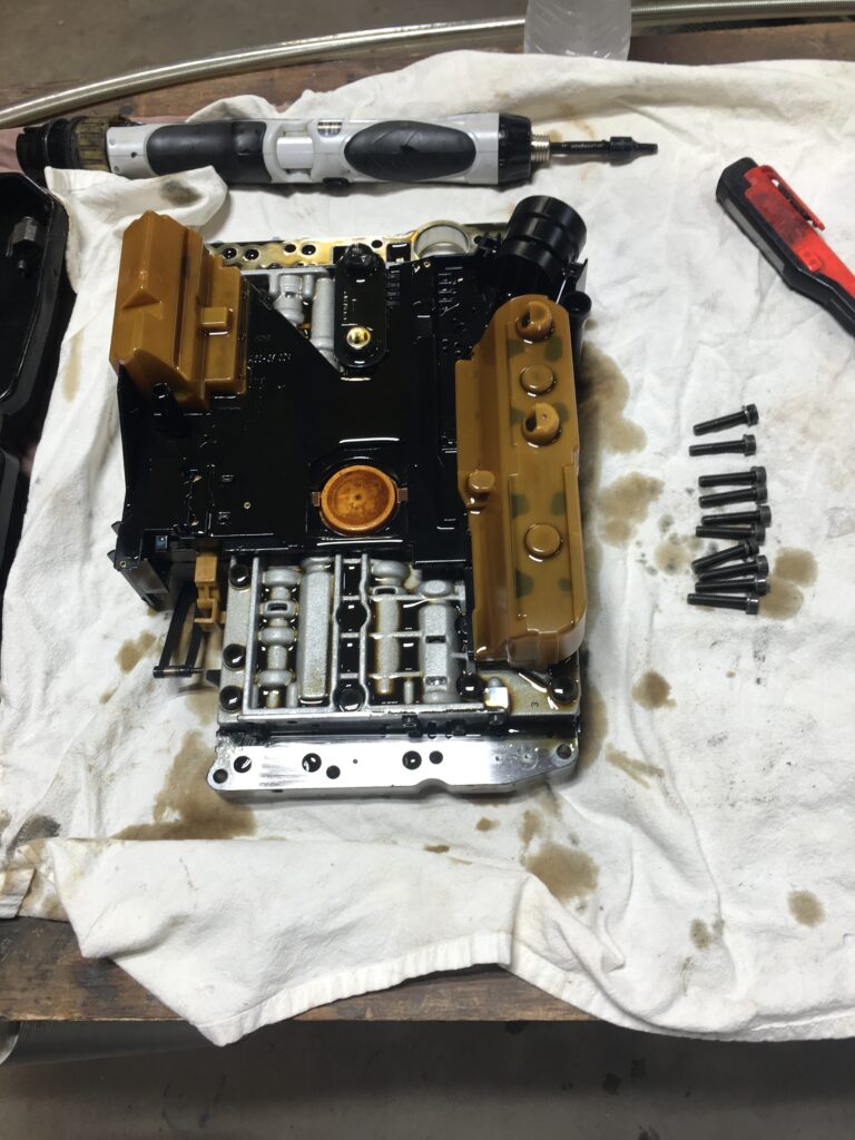Close-up of a disassembled Mercedes Benz transmission conductor plate attached to the transmission valve body
.