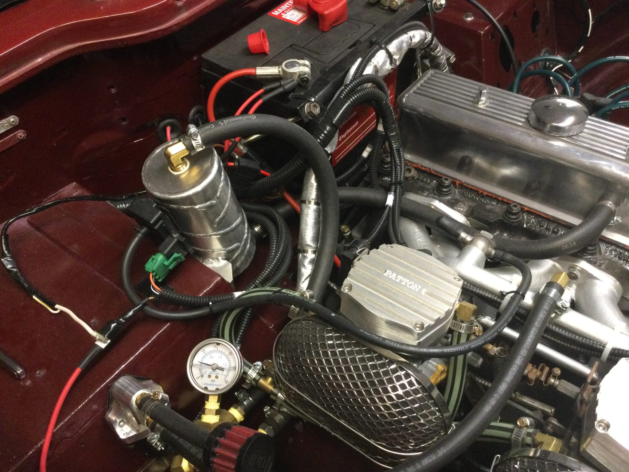 Triumph TR6 Restoration converting The Strombergs to TBI fuel